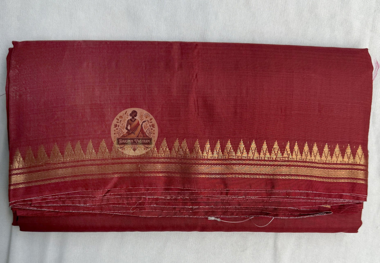 Full flat lay of Bishnupur Pure Katan Silk saree with heritage motifs showing complete drape and blouse piece