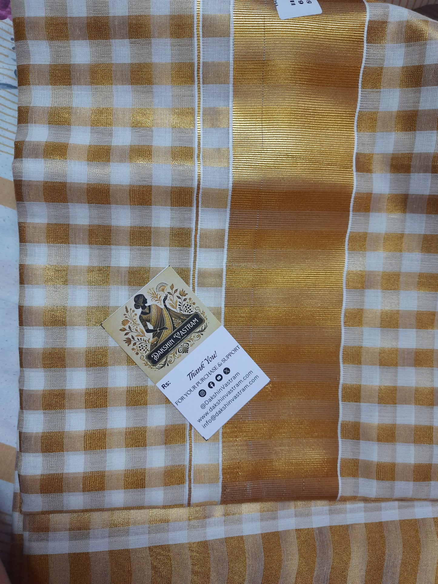 Blouse piece of Handloom Tissue Checked Saree with matching checked design and soft fabric