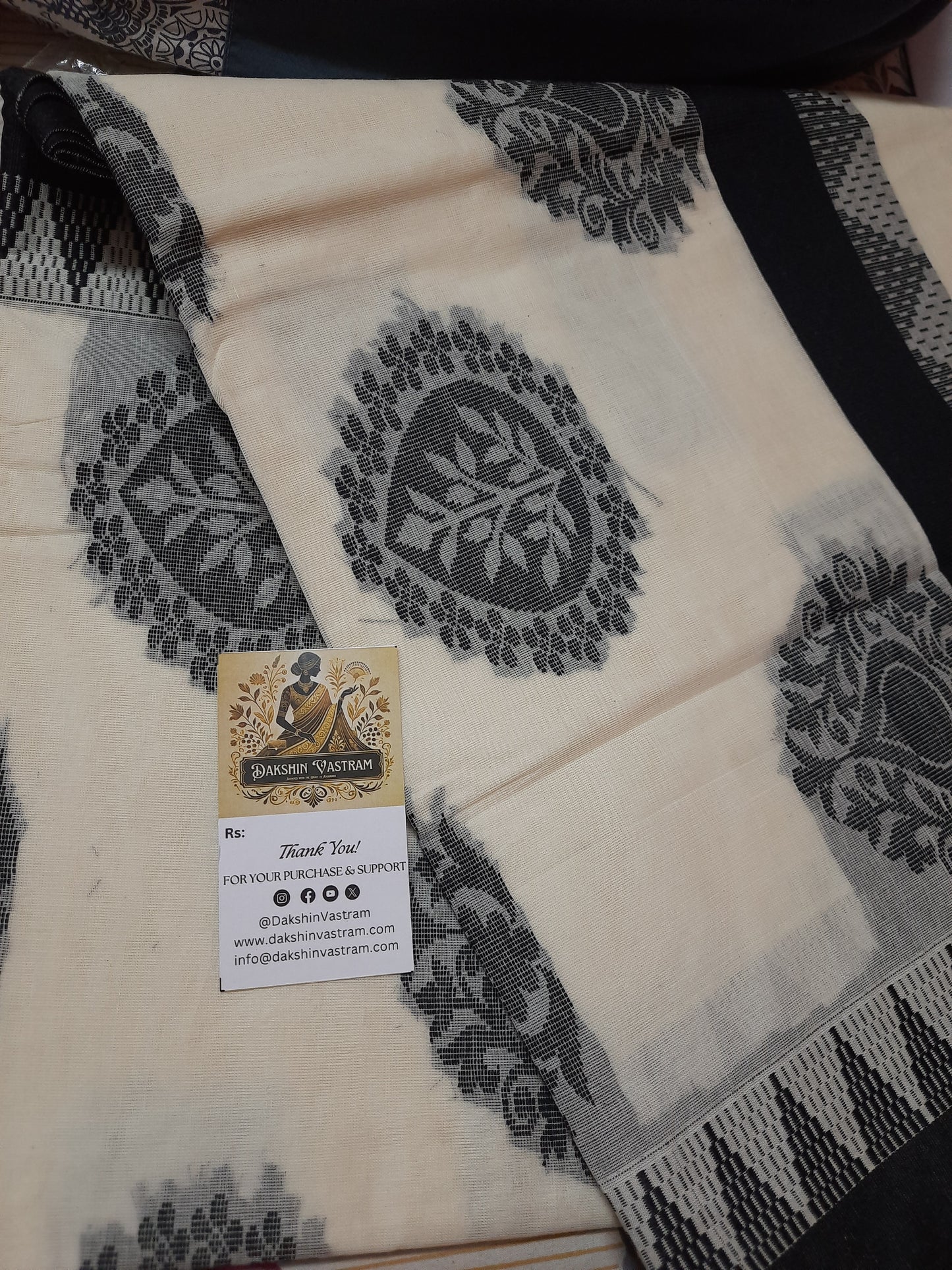 Rear view of Kasavu Saree highlighting the intricate details on the border and pallu