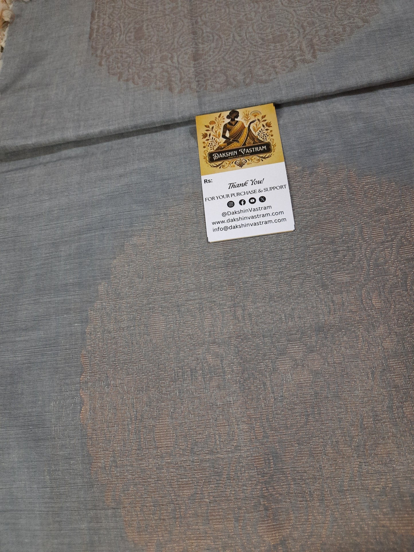 Fabric Full View: Full view of handloom fabric with delicate copper zari accents, ideal for eco-friendly fashion pieces.