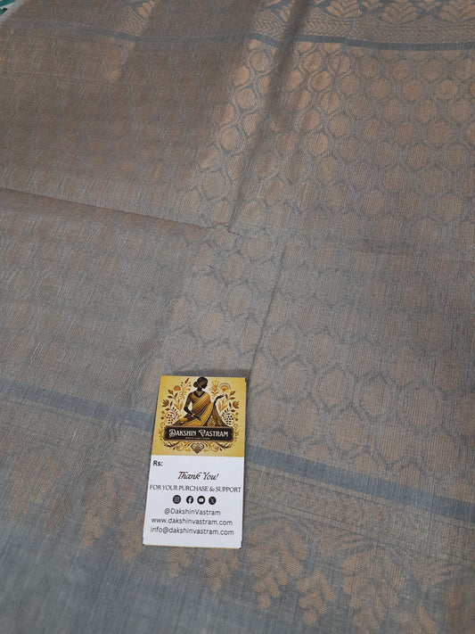 Fabric Side View: Side profile of handloom fabric with copper zari work, highlighting the softness and luxurious feel.