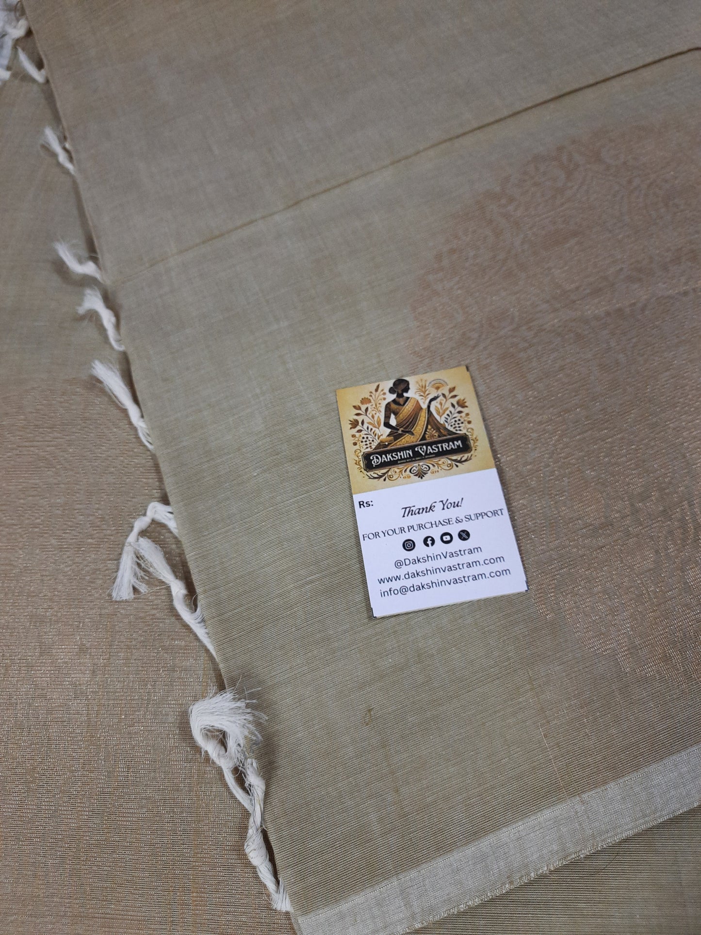 Close-up of Handloom Copper Zari with delicate copper motifs woven into soft organic cotton