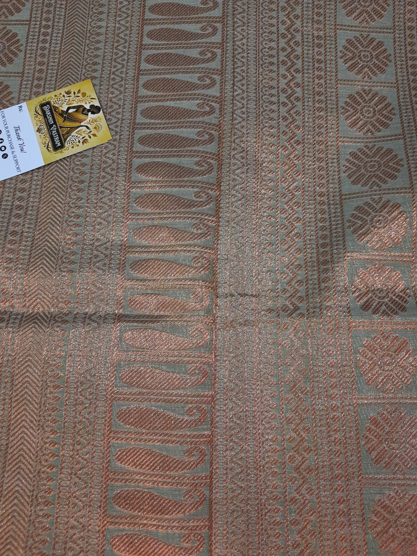 Side view of Handloom Organic Cotton with Copper Zari, highlighting fine craftsmanship and texture
