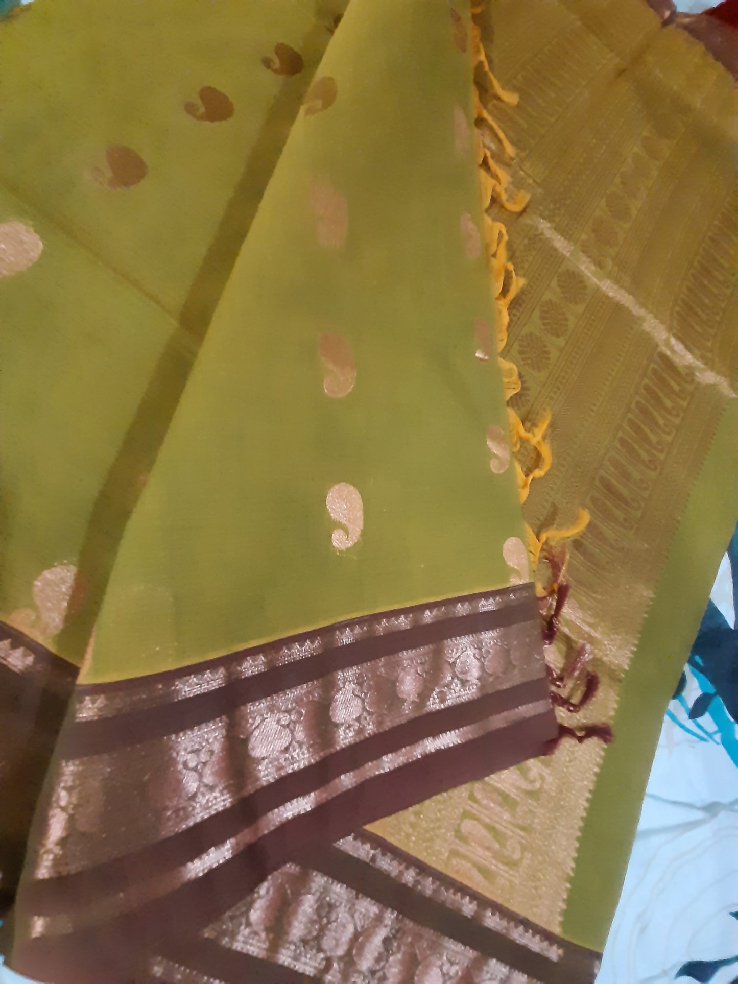 Close-up of Handloom Copper Zari with copper motifs woven into organic cotton