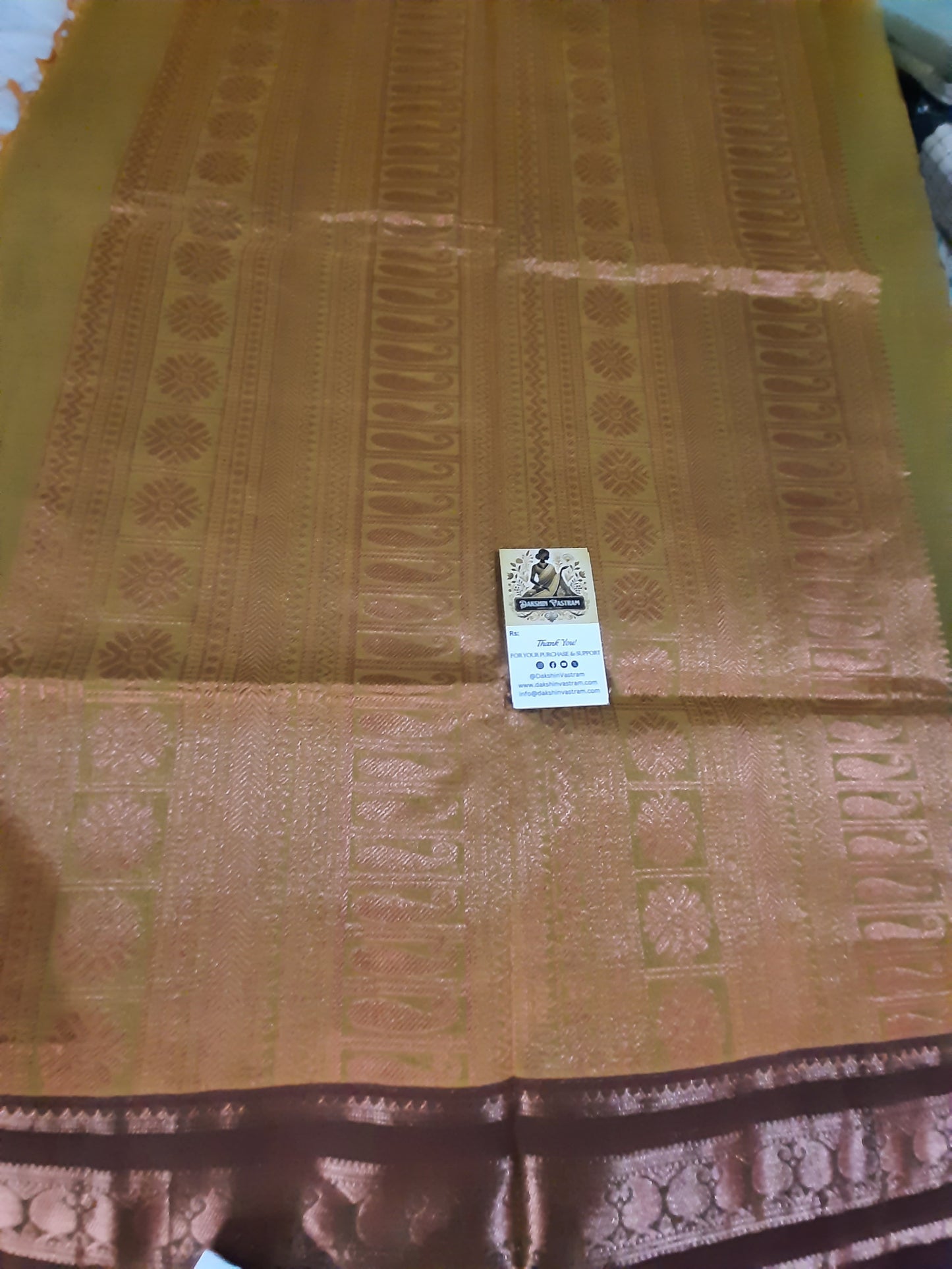 Side view of Handloom Copper Zari fabric showcasing eco-friendly craftsmanship and texture