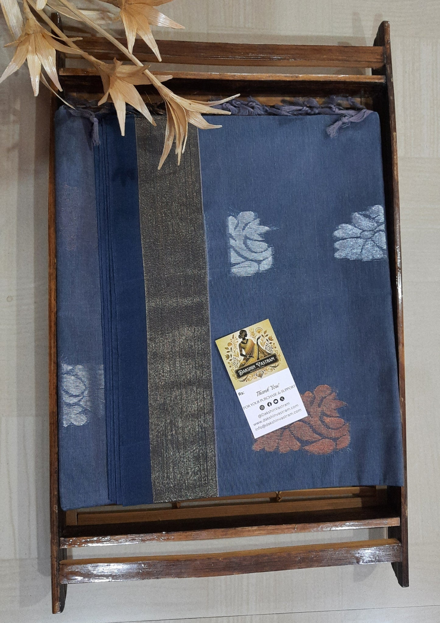 Handloom Copper Zari | Expertly crafted, this Handloom Copper Zari fabric features a luxurious silver color woven with high-quality copper threads