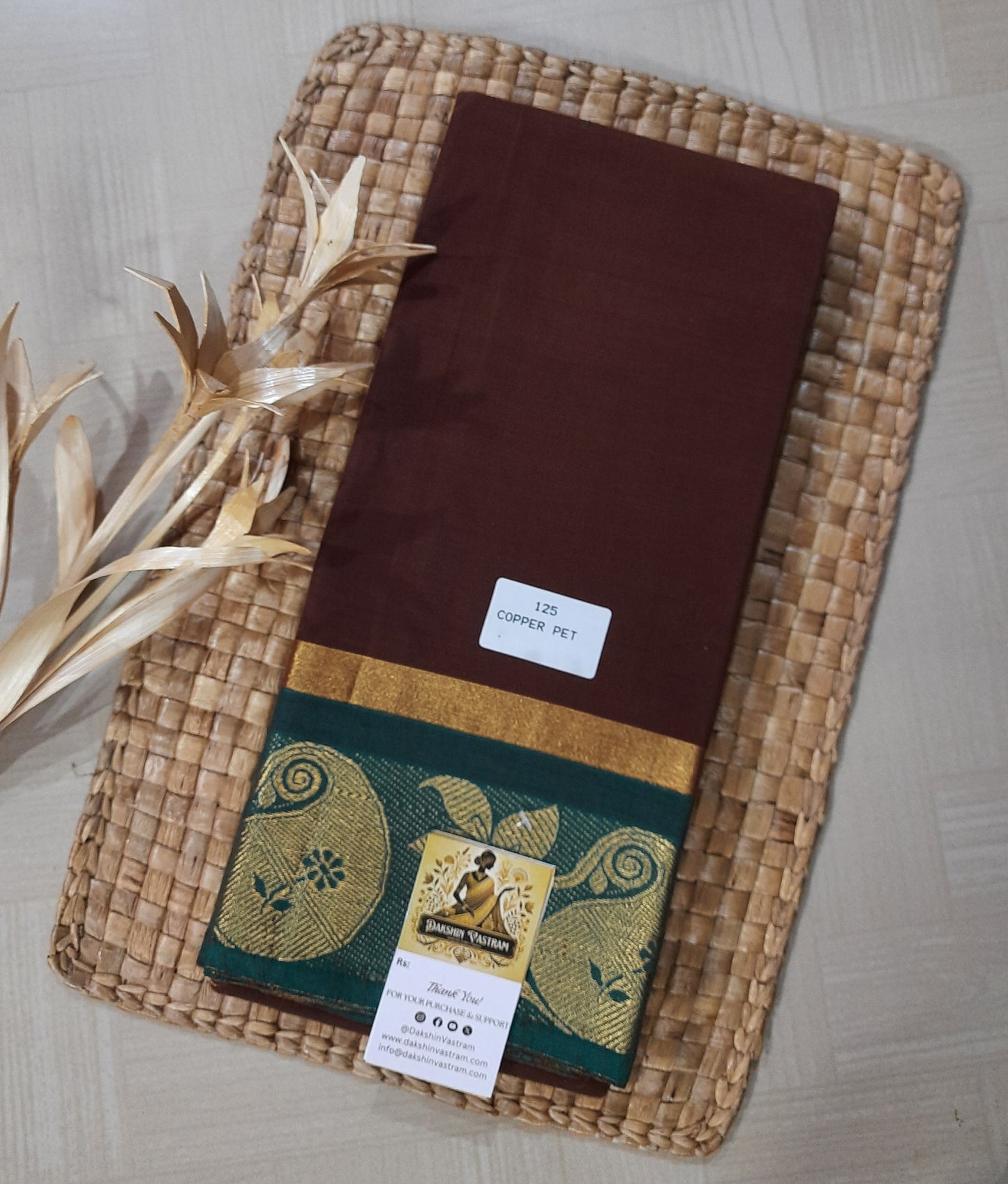 Saree Front View: Copper Pet Saree front view showcasing organic cotton fabric and delicate handloom design.
