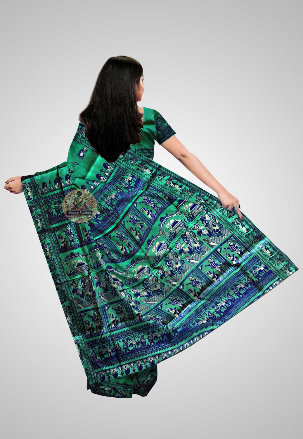 Smooth, lustrous handwoven silk saree with intricate design details