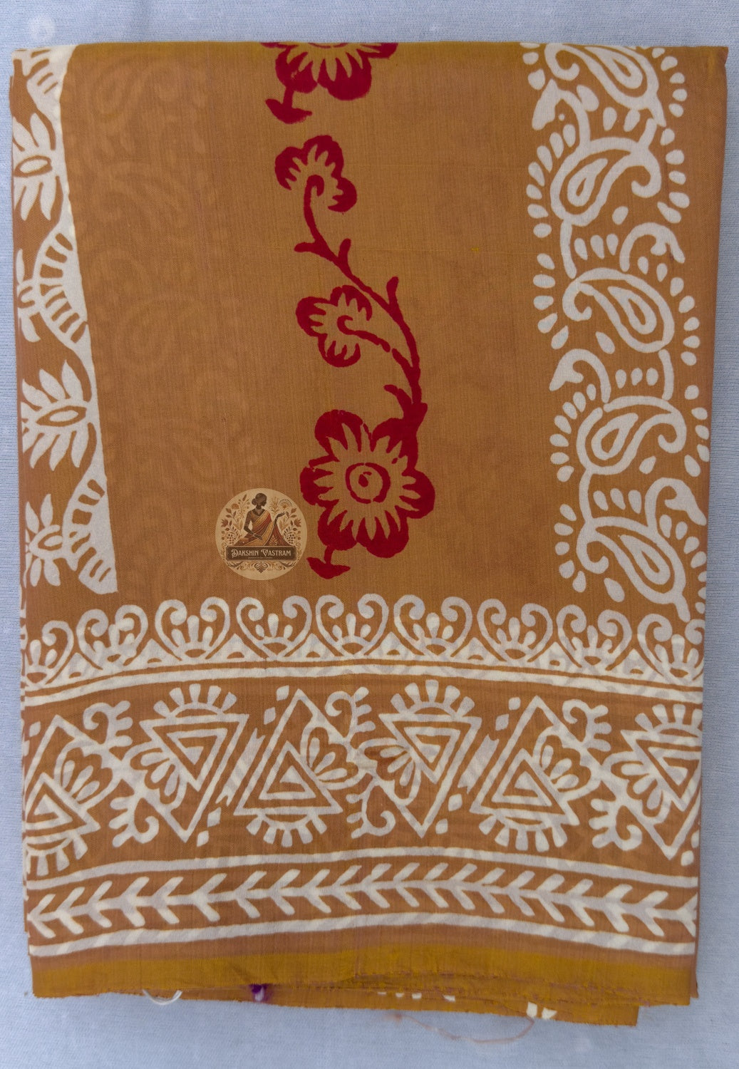 Close-up of Bishnupur pure Katan silk saree weave showing dense handloom texture and natural silk lustre, Bengal