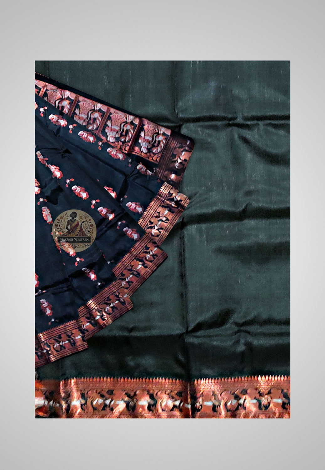 Traditional silk saree with rich texture and golden details