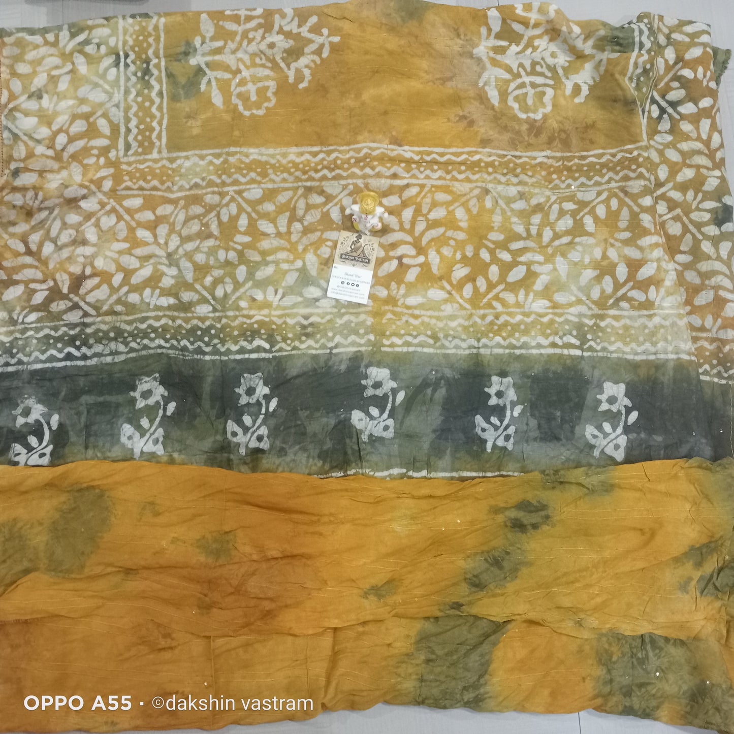 Saree Rear View: Rear view of Dola Cotton Saree, emphasizing its breathable cotton fabric and delicate drape.