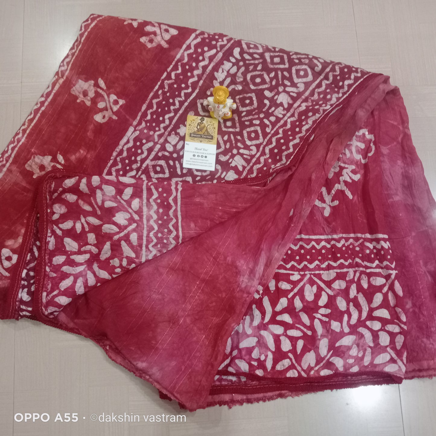 Saree Rear View: Rear view of Dola Cotton Saree, emphasizing the comfortable, natural cotton fabric and timeless design.