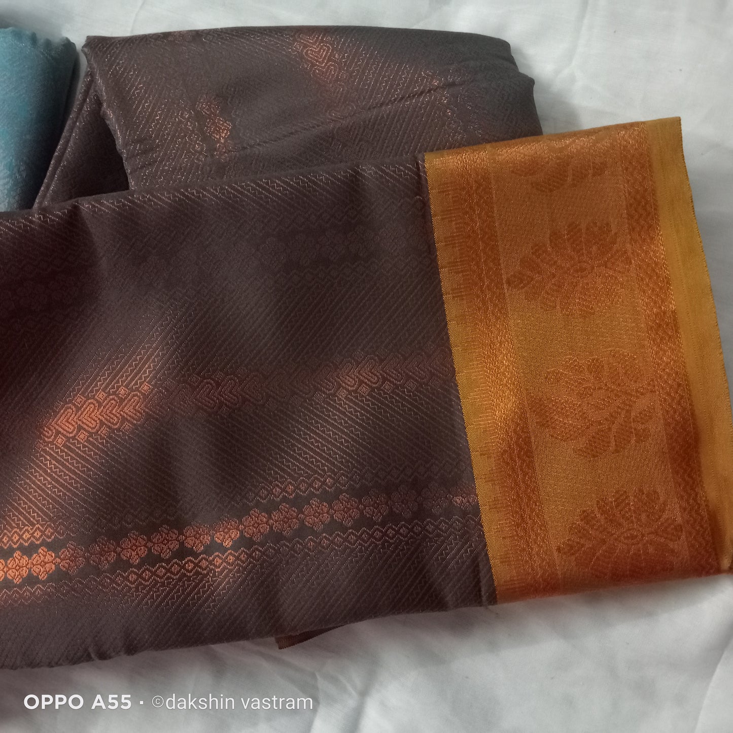 Blouse Piece: Matching blouse piece of Mow Silk Saree, complementing the saree’s design and luxurious fabric.
