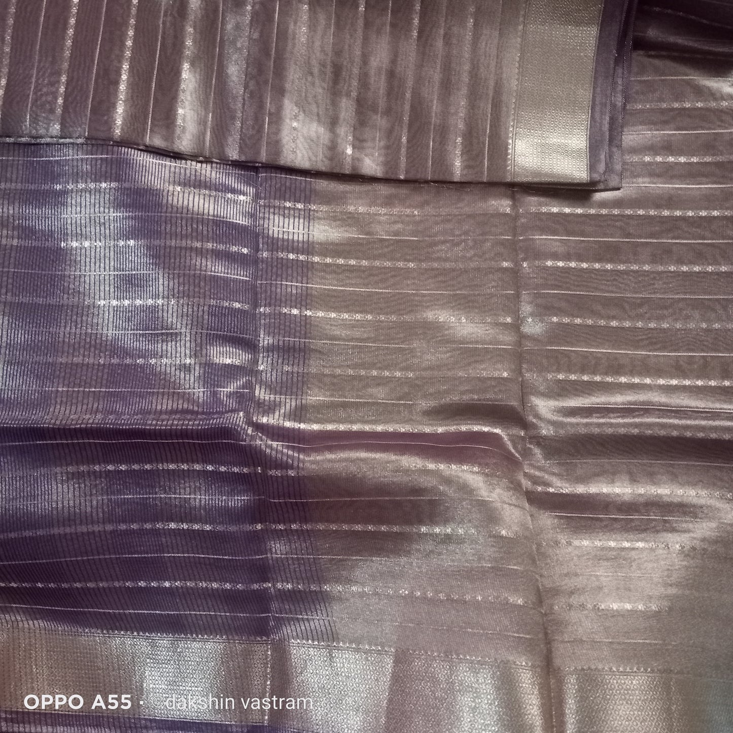 Close-up of Korat Tissue Silk showcasing the fine fibers and shimmering texture