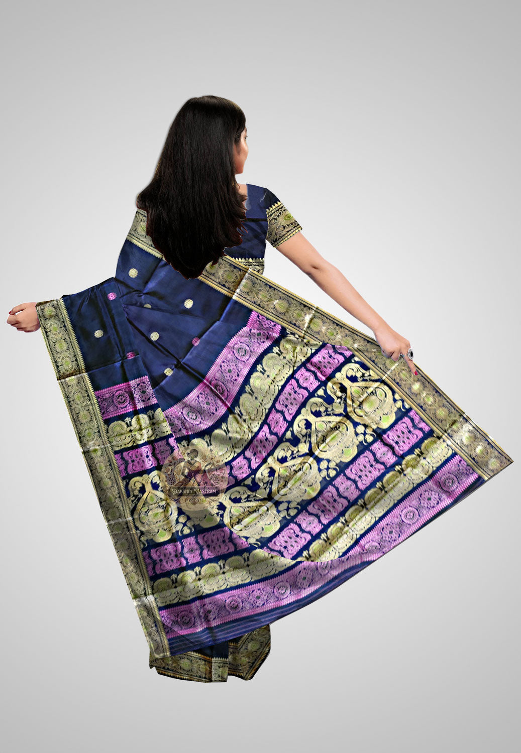Saree Rear View: Rear view of Baluchari saree showcasing fine craftsmanship and luxurious sheen.