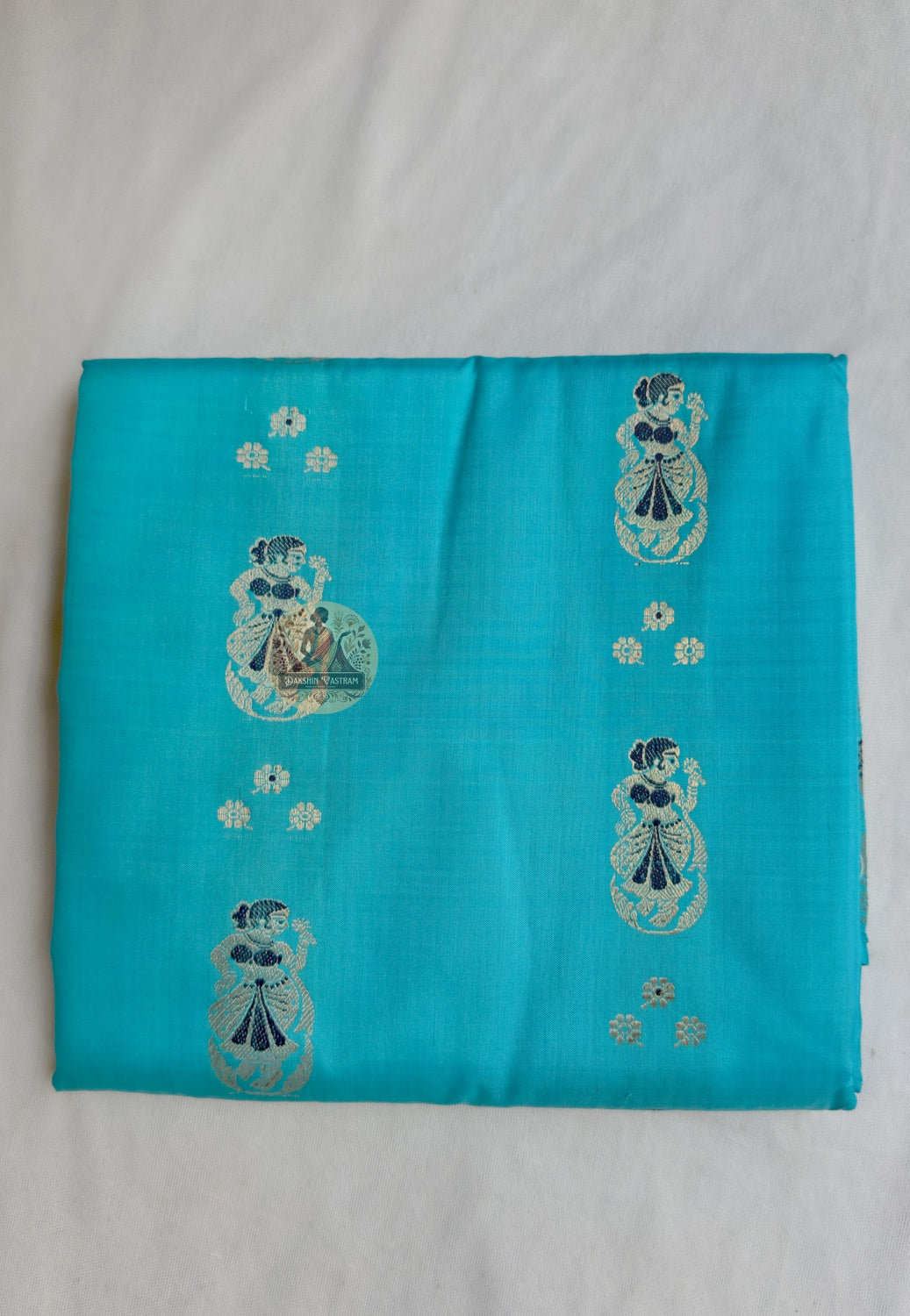 Full flat-lay of Swarnachari pure silk saree with golden zari heritage border, narrative pallu with Mughal and temple references, fine buti field, and matching unstitched blouse piece, West Bengal handloom
