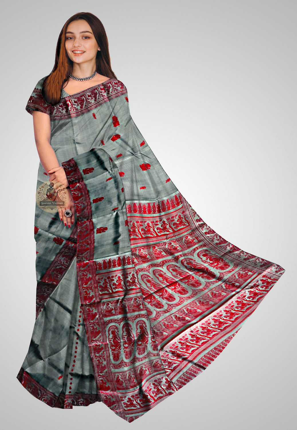 Handloom Baluchari silk saree with intricate design and lustrous fabric