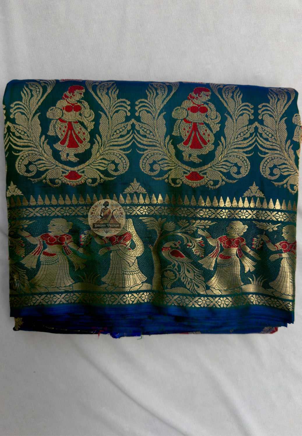 Close-up of handwoven silk weave on Swarnachari saree showing golden zari thread and natural sheen
