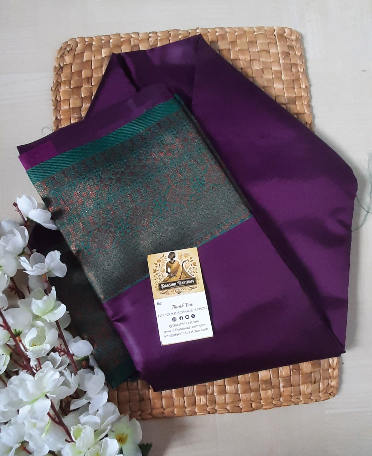 Side profile of the Mow Silk Saree draped gracefully with a lustrous, timeless shine.