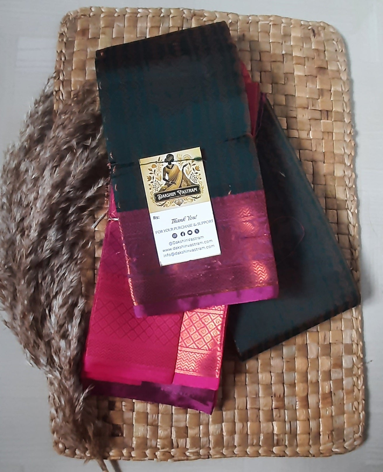 Saree Rear View: Rear view of Soft Art Silk Saree emphasizing its luxurious drape and sleek finish.