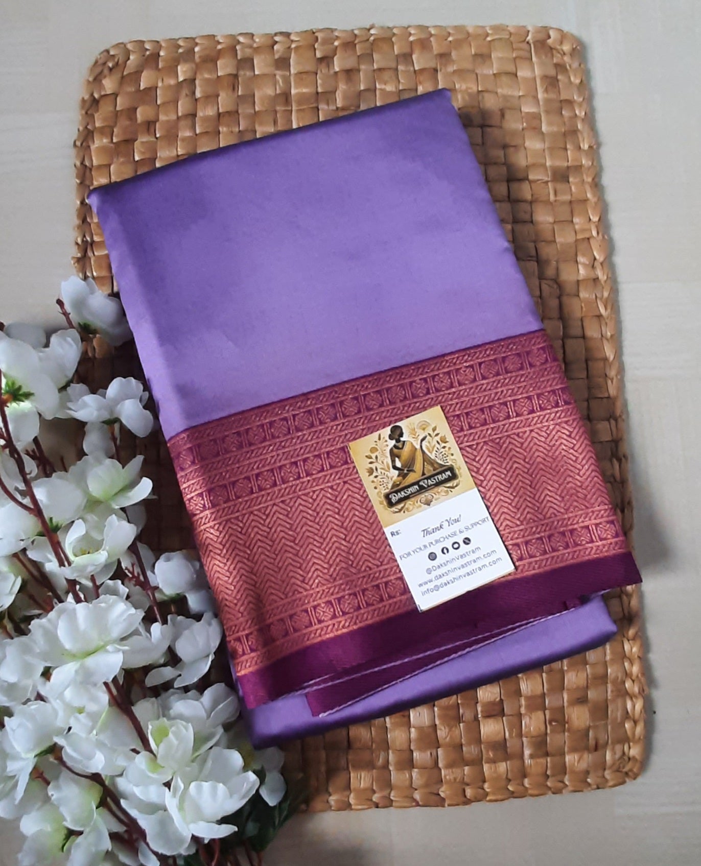 Saree Front Side: Front view of the Mow Silk Saree, showcasing its glossy texture and intricate design.