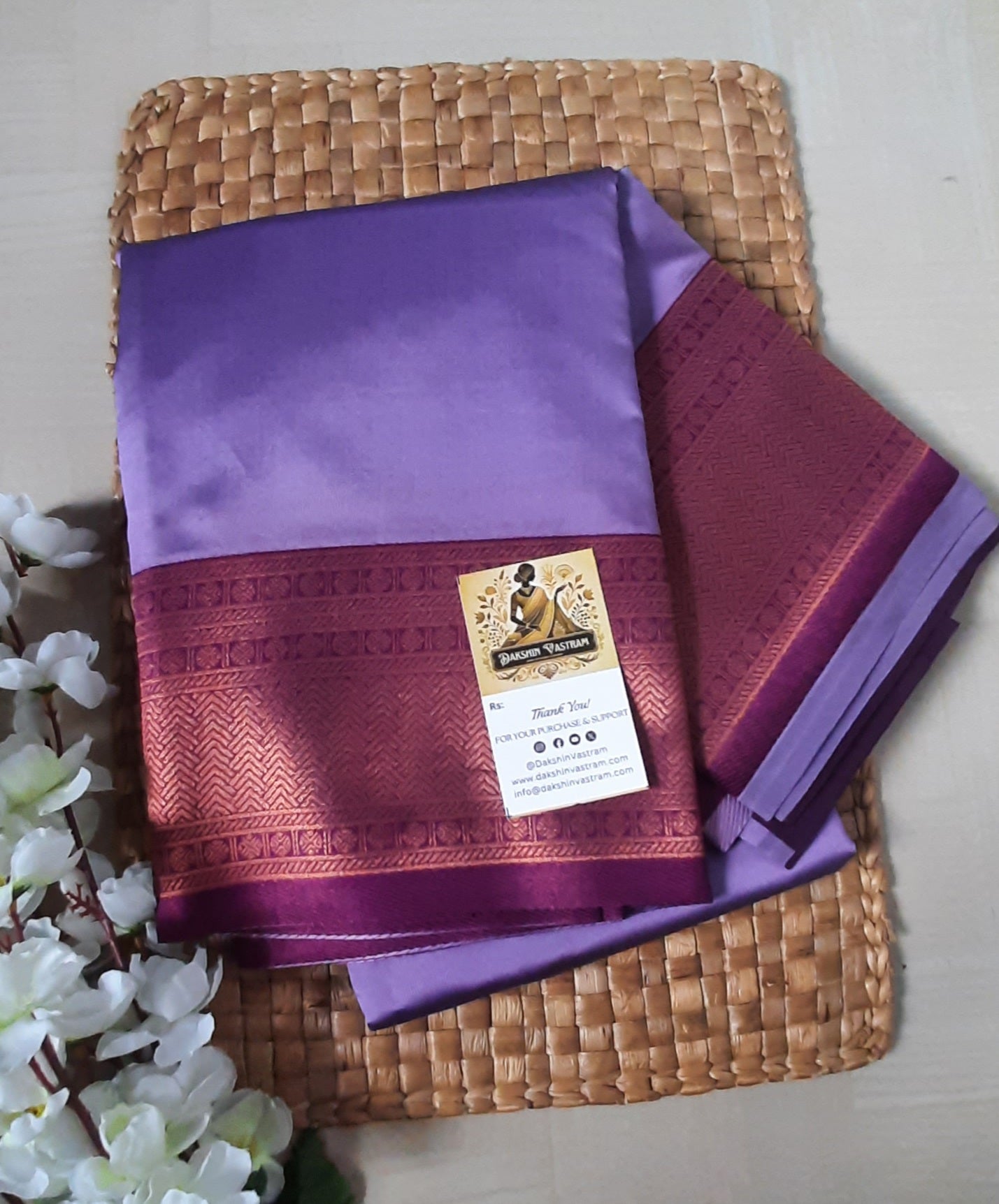 Saree Close-up: Close-up of the handwoven artistry, showcasing the lustrous organic silk fabric of the Mow Silk Saree.