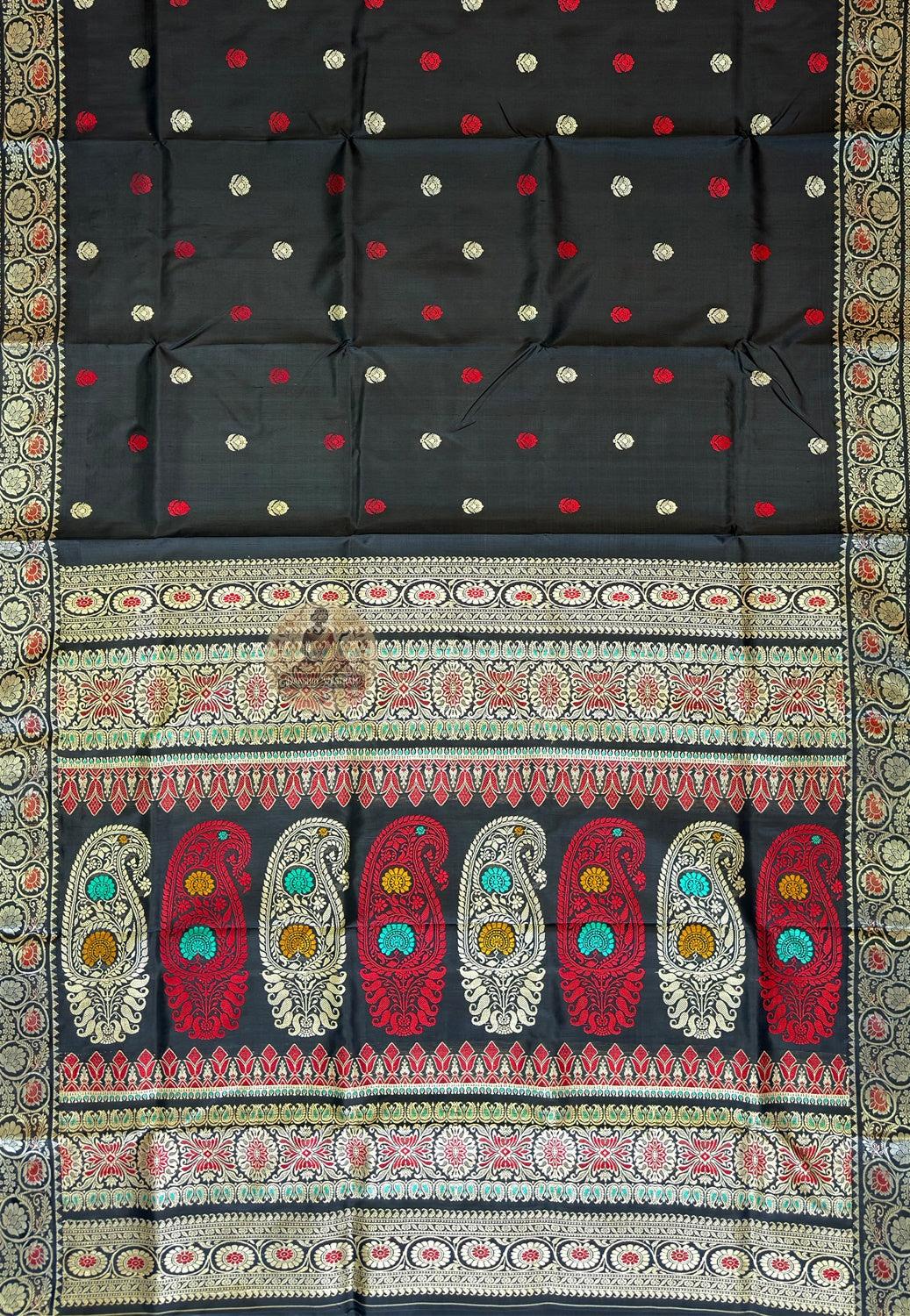 Close-up of handwoven narrative motifs on Baluchari Pure Silk Saree, revealing intricate mythology figures and Nawabi court scenes woven thread by thread into premium pure silk by a master Baluchari weaver