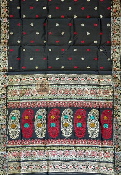 Close-up of handwoven narrative motifs on Baluchari Pure Silk Saree, revealing intricate mythology figures and Nawabi court scenes woven thread by thread into premium pure silk by a master Baluchari weaver