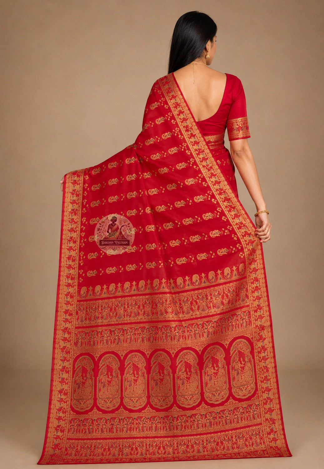 Front view of woman wearing Swarnachari pure silk saree in traditional Bengali drape, golden zari pallu resting over left shoulder with natural silk fall