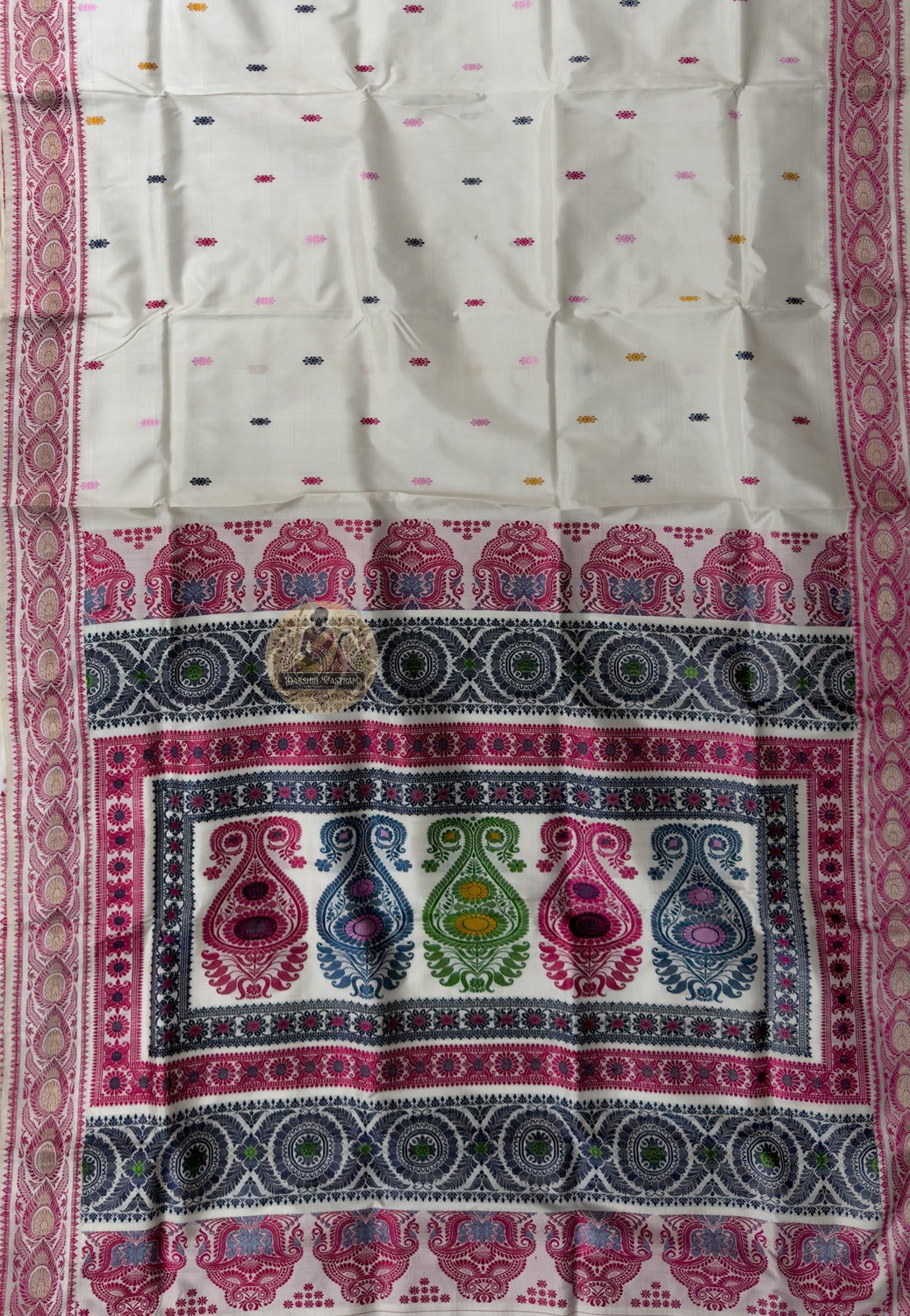 Side view of Baluchari Silk Saree showing pure silk drape and handloom woven cosmic disc and conch shell border
