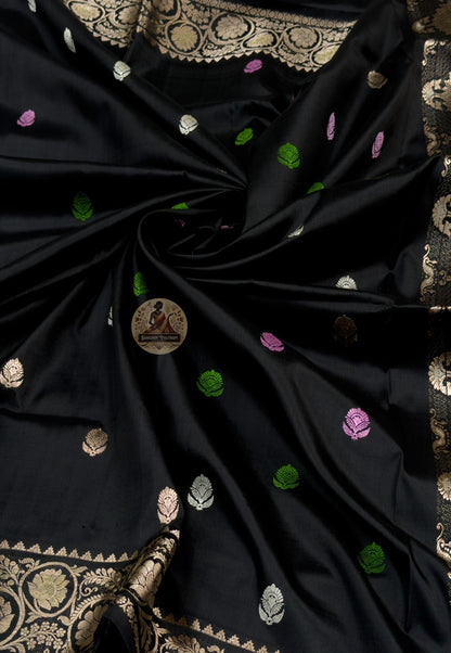 Close-up of premium Swarnachari handloom silk saree body showing warm pure silk ground with fine golden zari butis (small woven motifs) drawn with threshold precision, each detail contributing to the crossing, Bengal craft
