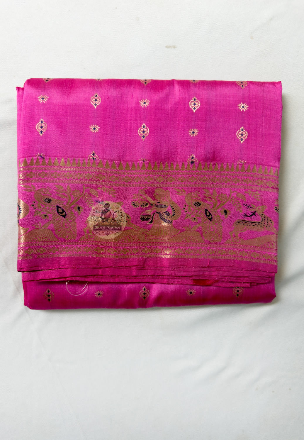 Close-up of pallu of Swarnachari pure silk story saree showing golden zari Bishnupur temple art and Ramayana narrative compositions translated from text and stone into wearable silk