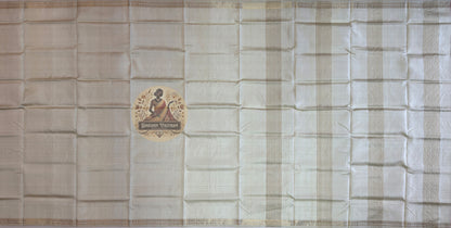 Macro close-up of individual hand-woven heritage motif on Bishnupur Katan Silk Saree by Dakshin Vastram, each pattern passed down through generations of Bishnupur weaving families