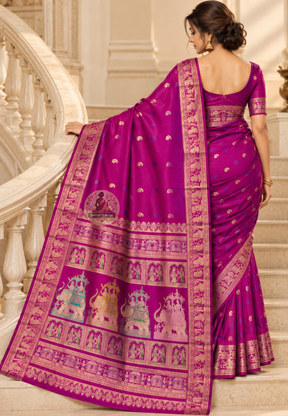 Side view of magenta Swarnachari silk saree showing the drape and patterned border