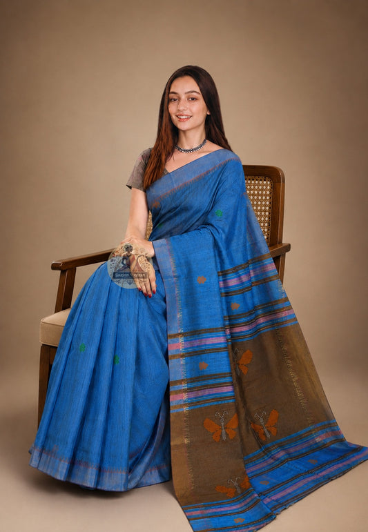 Front view of woman in handloom Bishnupur Katan silk saree, traditional Bengali drape showing naturally lustrous pure Katan silk with the quiet authority of Bishnupur's heritage weave
