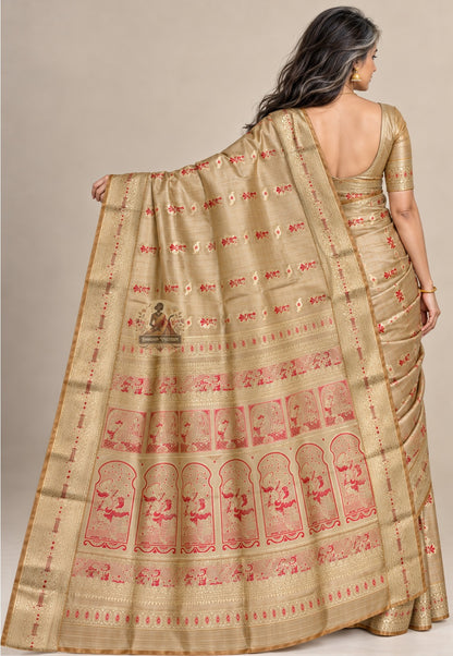 Rear view of beige gold Swarnachari silk saree with the red-accented pallu draped over the shoulder