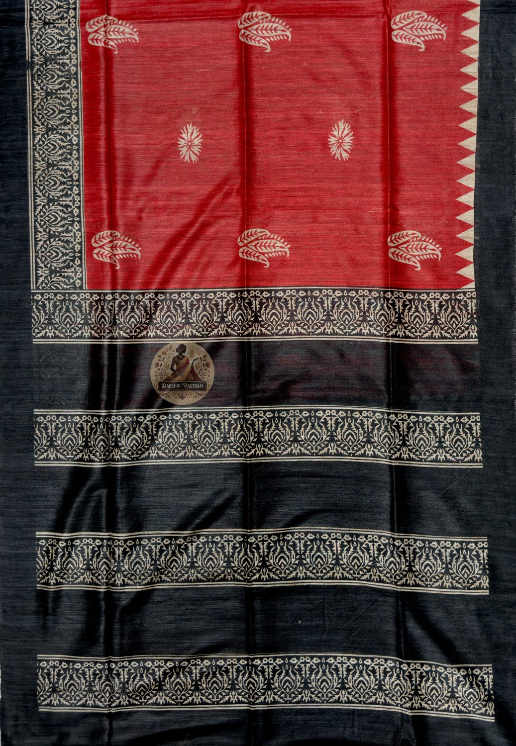 Full saree view of red Ghicha Tussar silk saree with black borders and a contrasting banded pallu