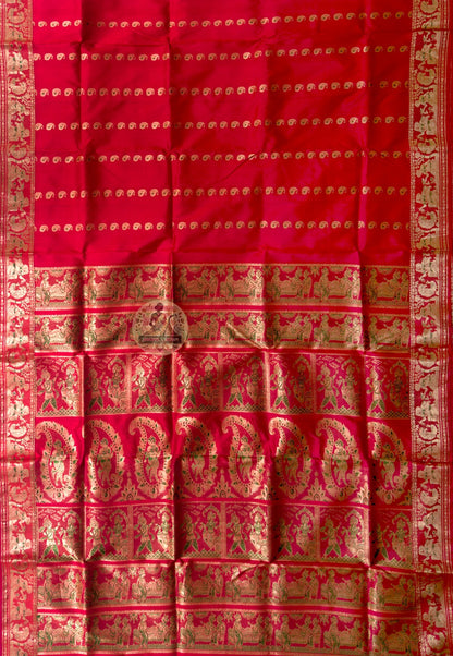 Rear view of Swarnachari silk saree displaying golden zari pallu with hand-woven Bengal temple and Ramayana story compositions held in suspension, West Bengal handloom