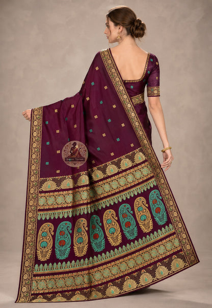 Front view of woman in Swarnachari pure silk saree, traditional Bengali drape with golden zari pallu carrying Bengal's craft dialogue over left shoulder, gold speaking before the wearer does