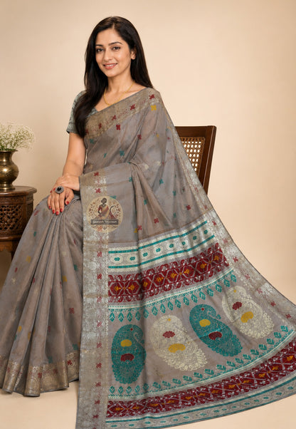 Side view of Baluchari Pure Silk Saree showing the graceful weighted fall and natural sheen of handwoven pure silk with traditional Baluchari buti motifs repeating across the body with timeless confidence