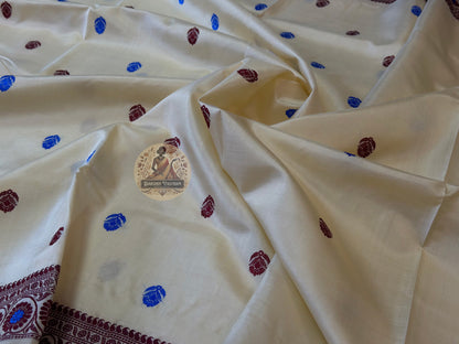 Detailed close-up of hand-woven border on premium Baluchari Silk Saree showing geometric temple-inspired Bishnupur weave patterns in fine pure silk thread craftsmanship
