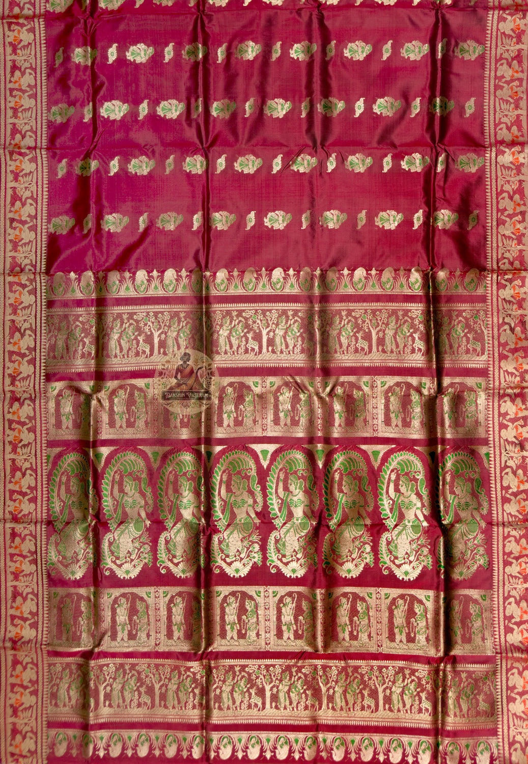 Full saree view of red Swarnachari silk saree with repeating motifs and an elaborate figurative pallu