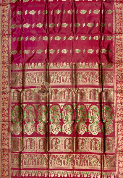 Full saree view of red Swarnachari silk saree with repeating motifs and an elaborate figurative pallu