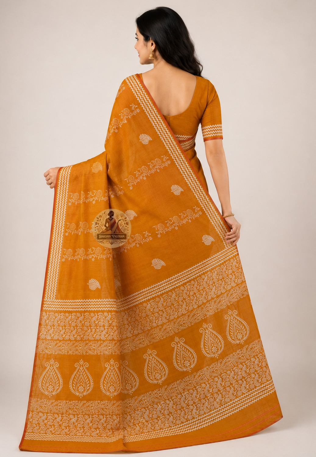 Rear view of handwoven Bishnupur Katan Silk Saree revealing the full pallu with restrained heritage motifs drawn from Bishnupur's terracotta temple tradition, woven in pure Katan silk