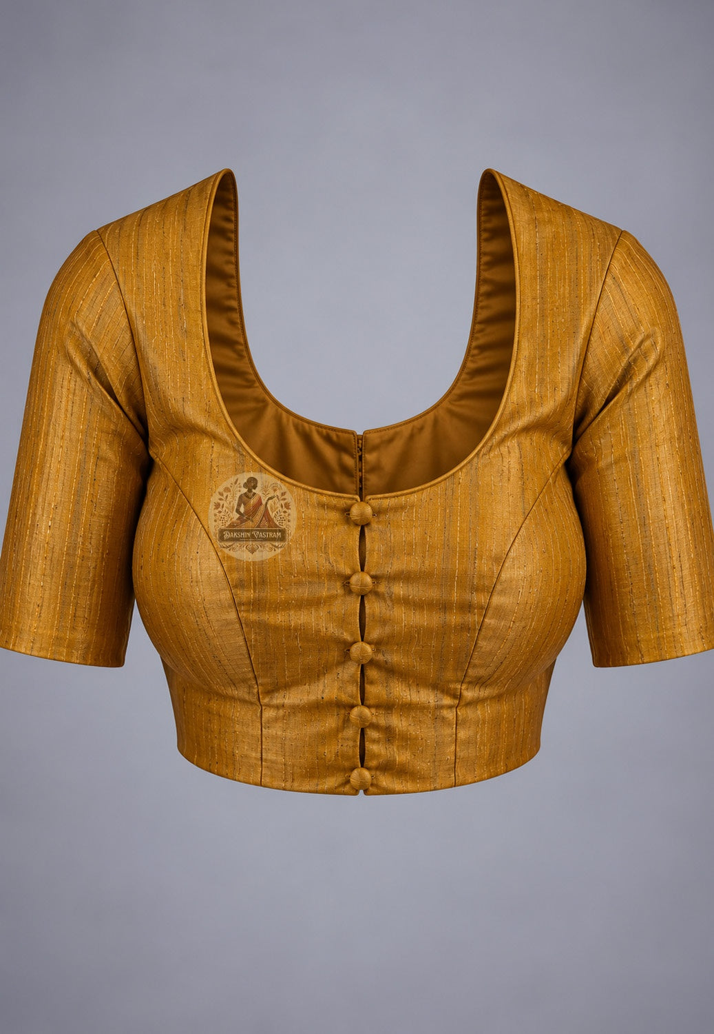 Blouse paired with mustard Ghicha Tussar silk saree in a coordinating mustard shade with patterned sleeve borders