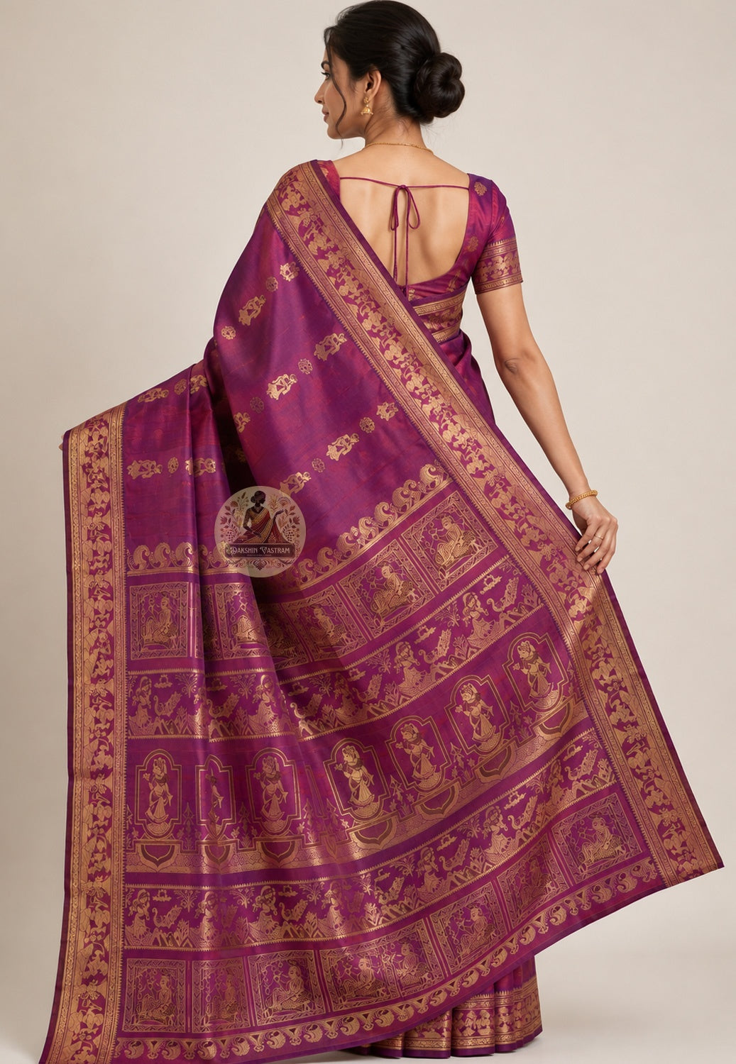 Front view of woman wearing Baluchari Silk Saree with antique gold jewellery, Durga Puja festive occasion