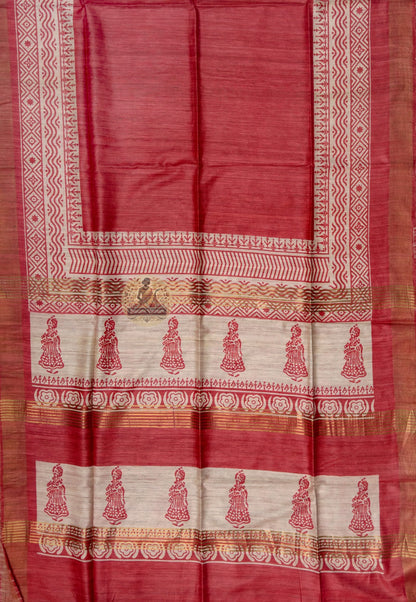Close up of red Ghicha Tussar silk saree border with diamond and zigzag patterns