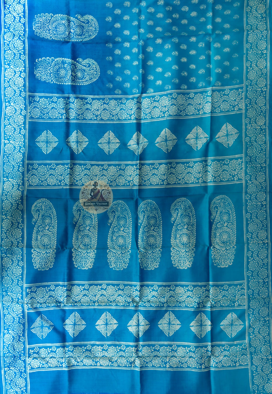 Close-up of handwoven running vine lattice with zari sunflower buti detail on Bishnupur Katan Silk Saree border