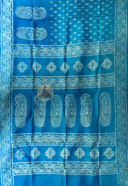 Close-up of handwoven running vine lattice with zari sunflower buti detail on Bishnupur Katan Silk Saree border