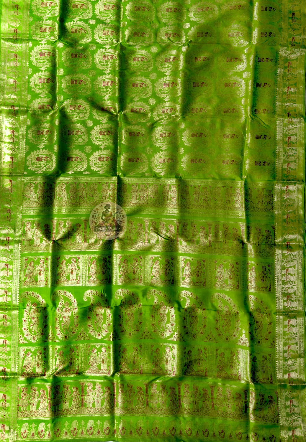Side view of Swarnachari Pure Katan Silk Saree showing Dashami sindoor khela drape and golden zari red hibiscus handloom border Bishnupur